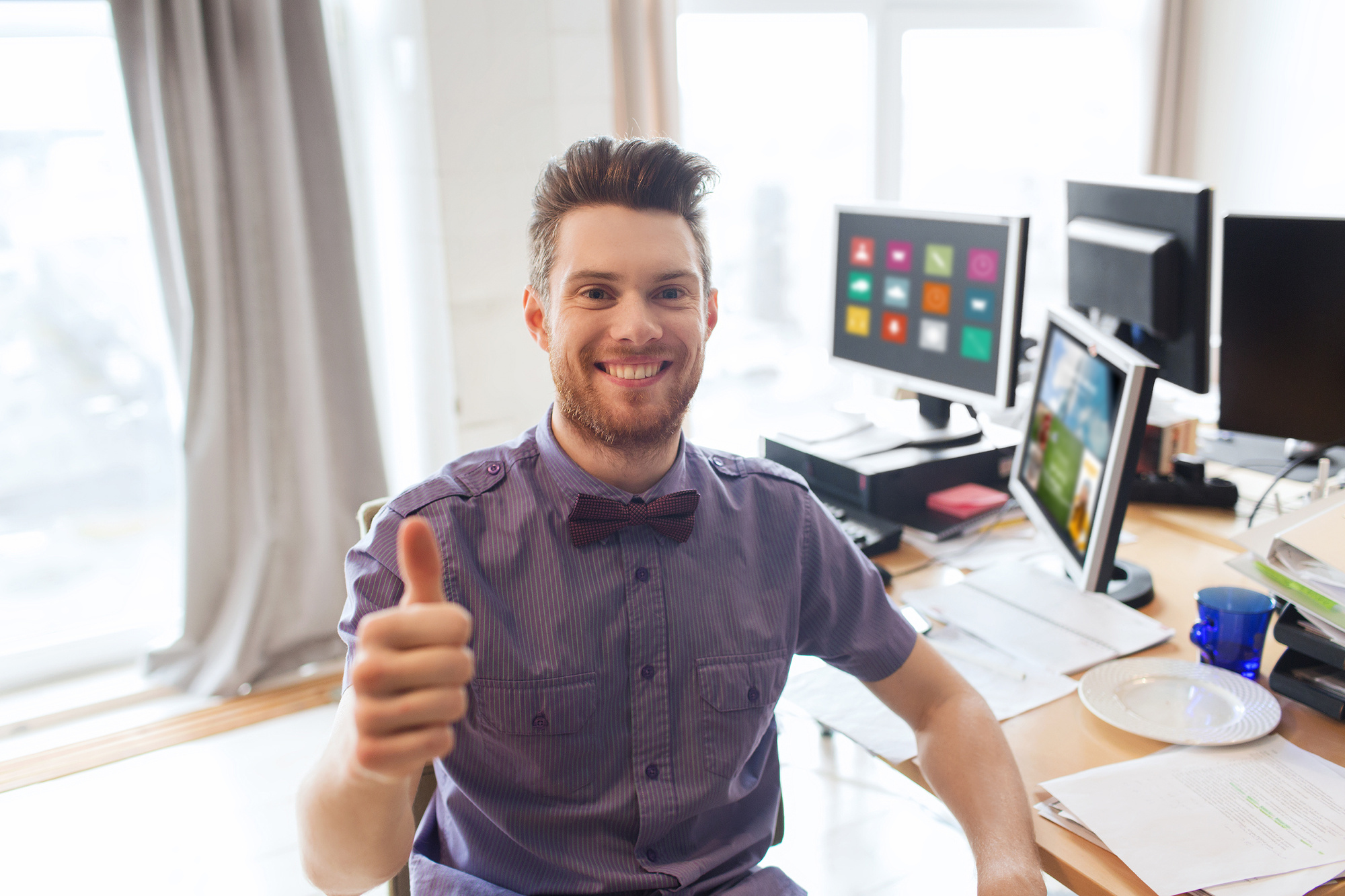 web designer with thumbs up