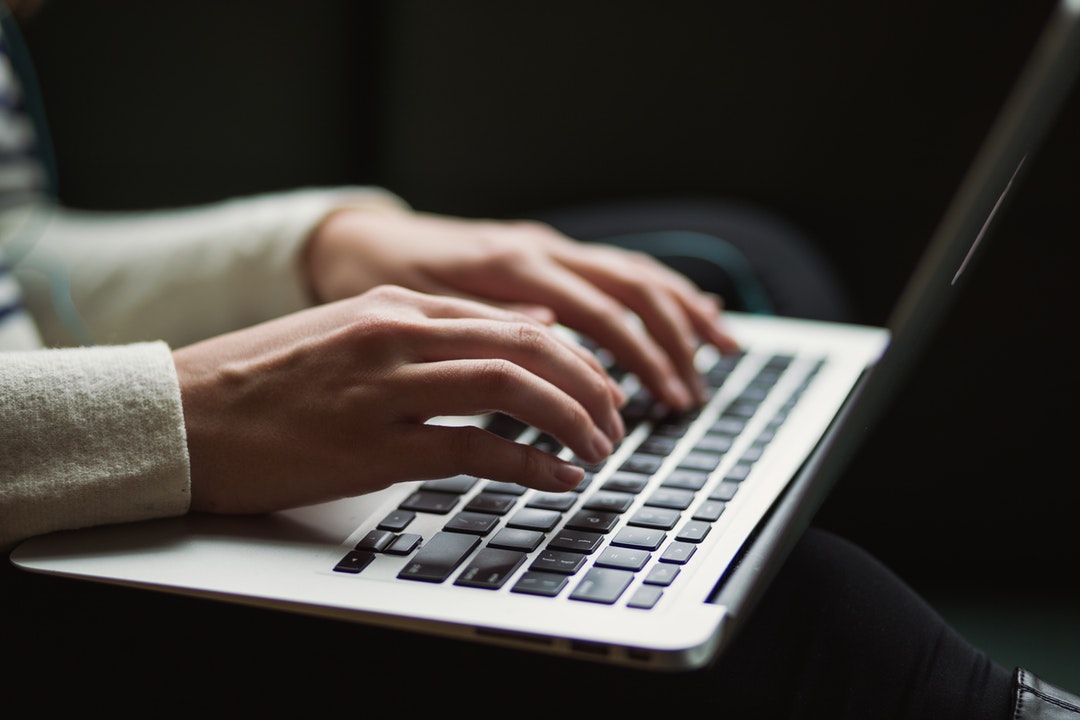 person on web on computer