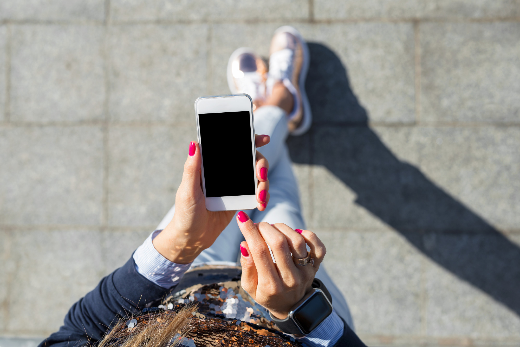 woman holding iphone